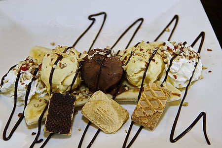 chocolate and vanilla ice cream on white surface thumbnail