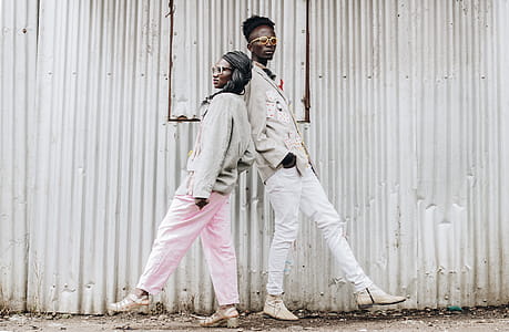 Man and Woman Standing Back to Back thumbnail