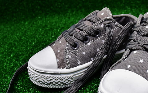 shallow focus photography of gray low-top sneakers thumbnail