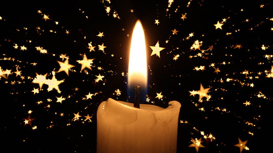 photo of lighted candle with sparks thumbnail