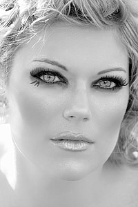 greyscale photography of woman's face wearing make up thumbnail