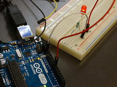 blue circuit board near white board thumbnail