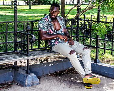 Man Wearing Ripped Jeans thumbnail