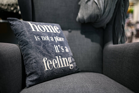 Collection of grey and white pillows thumbnail