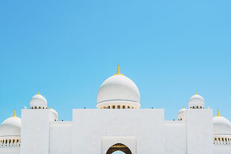 photo of white and yellow building thumbnail