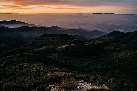 landscape photography of mountains at daytime thumbnail