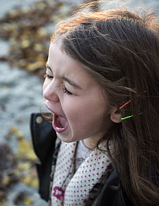 selective focus photography of girl screaming thumbnail