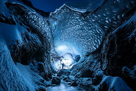 man standing inside cave thumbnail
