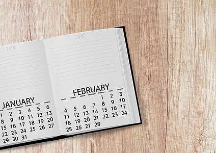 closeup photo of white and black calendar book thumbnail