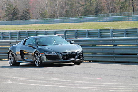 silver Audi coupe on road near trees at daytime thumbnail