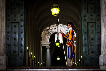 man standing near door thumbnail