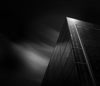 black building at night thumbnail
