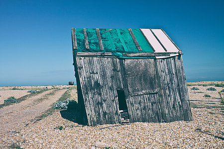 Shot of an old abandoned shack that has started to subside. Image captured in Dungeness, Kent, England thumbnail