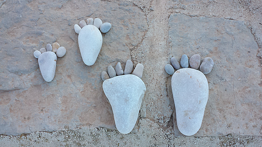 two pairs of feet stone formations thumbnail