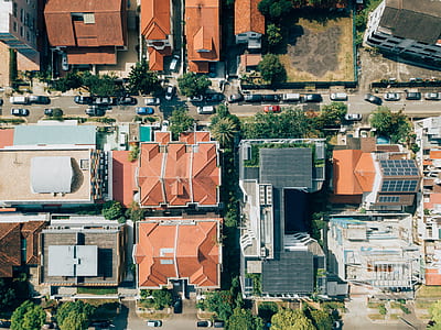 aerial photography of brown and black buildings at daytime thumbnail