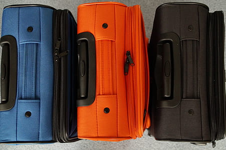 three inline assorted color softside luggage bags thumbnail