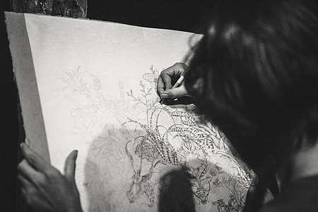 person doing flower artwork thumbnail