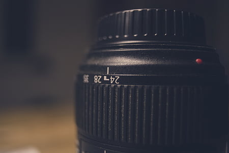 shallow focus photography of black DSLR camera lens thumbnail