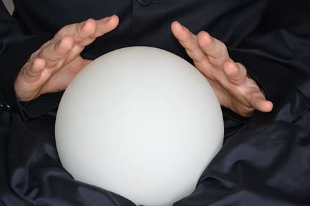 person holding round frosted glass ball thumbnail
