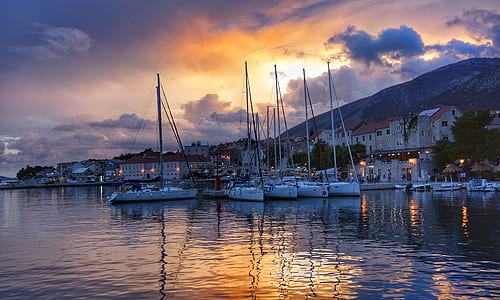 yacht beside the docking pier thumbnail