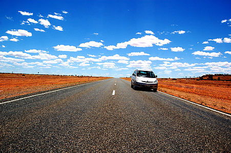 white van parked on road thumbnail