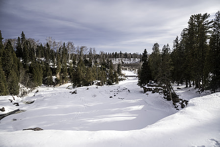Frozen Gooseberry River landscape covered in Snow at Gooseberry Falls State Park, Minnesota thumbnail