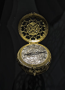 gold and silver pocket watch thumbnail