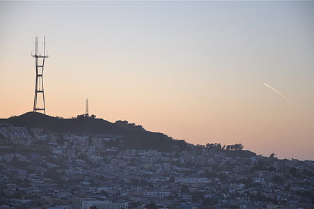 photo of mountain under white sky at daytime thumbnail