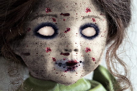 doll wearing green top thumbnail