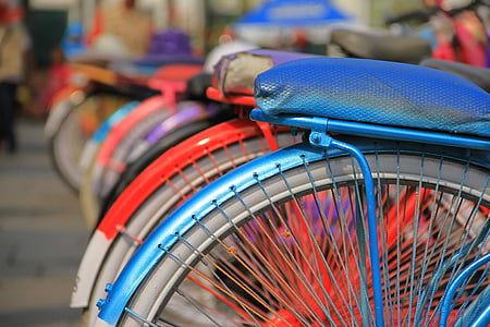 closeup of blue and red bikes thumbnail