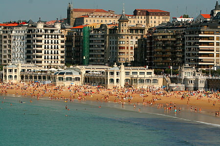 photography of city building near sea thumbnail
