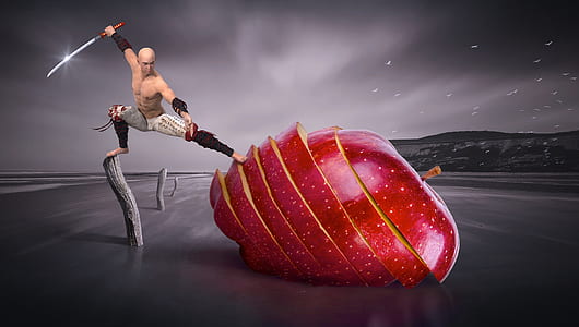 man holding sword slicing large size apple thumbnail