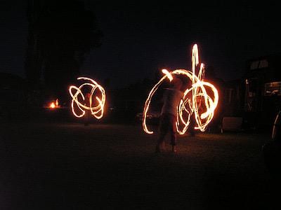 two person performing fire dance thumbnail
