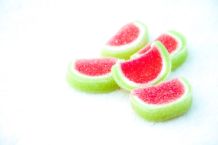 pink-and-green pastries on white textile thumbnail