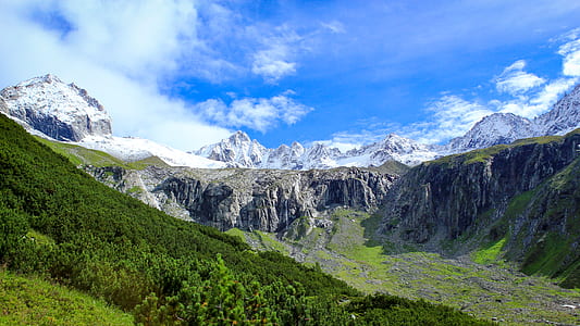 green mountains under blue sky thumbnail