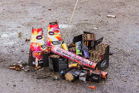 assorted fireworks boxes on gray pavement at daytime thumbnail