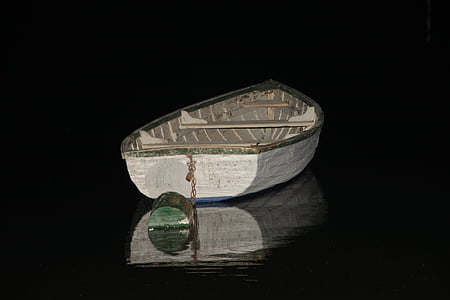 white boat on body of water thumbnail