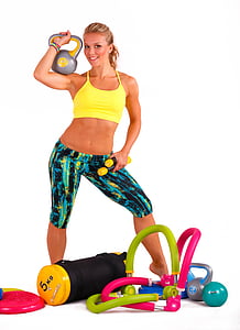 woman wearing yellow crop top and blue shorts thumbnail