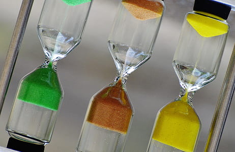 three clear hour glass half-filled thumbnail
