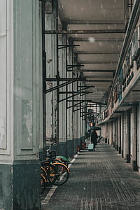 man walking towards street thumbnail