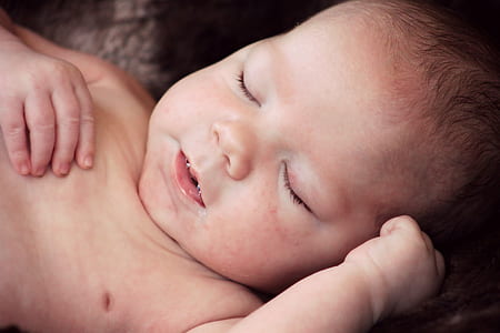 selective focus photography of sleeping baby thumbnail
