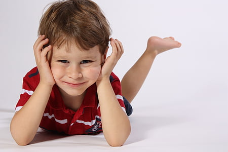 boy lying on floor thumbnail