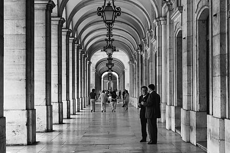 Two Persons Talking to Each Other on Hallway thumbnail