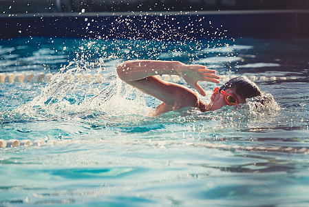 boy swimming at daytime thumbnail