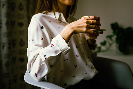 woman holding cup thumbnail