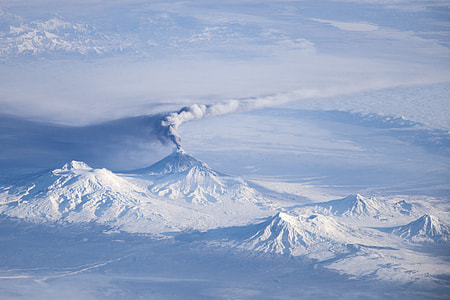 snow covered mountains under sunny sky thumbnail
