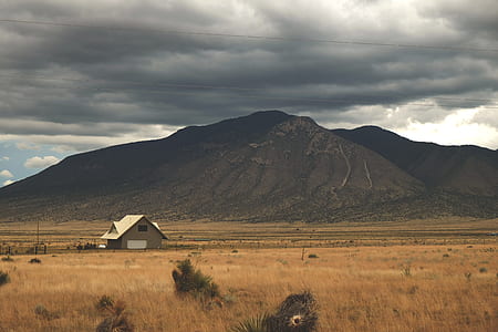 mountain under the cloudy sky thumbnail