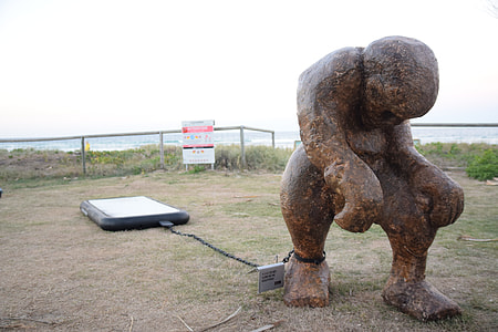 brown concrete statue thumbnail