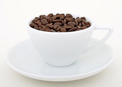 coffee beans on white ceramic coffee cup and saucer thumbnail
