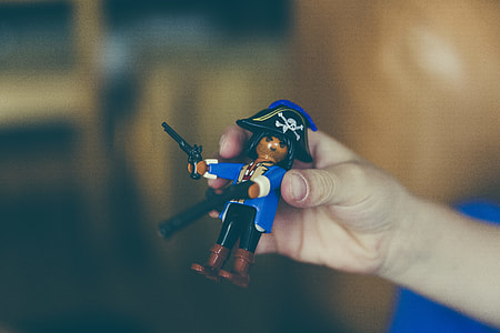 selective focus photo of pirate figurine thumbnail